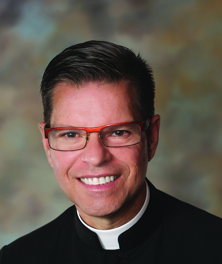 Portrait of Rev. Michael J. Russo.