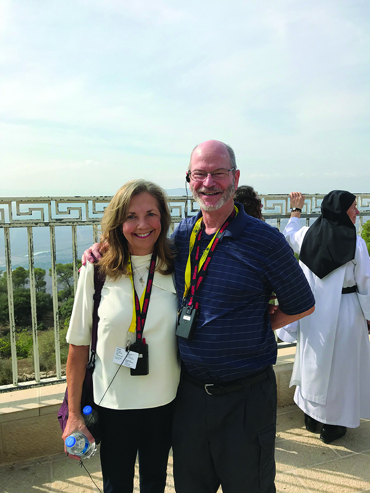 Fr. Ken and Shelley Wolfe stank at an overlook of the city of Nazareth 